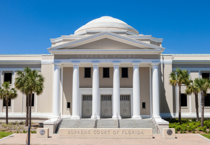 Florida Supreme Court building featured in article discussing the Perlmutter decision and punitive damages claims in Florida civil litigation