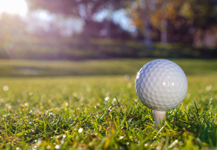 Golf ball on a tee representing Stinger Golf’s trademark litigation victory against LIV Golf