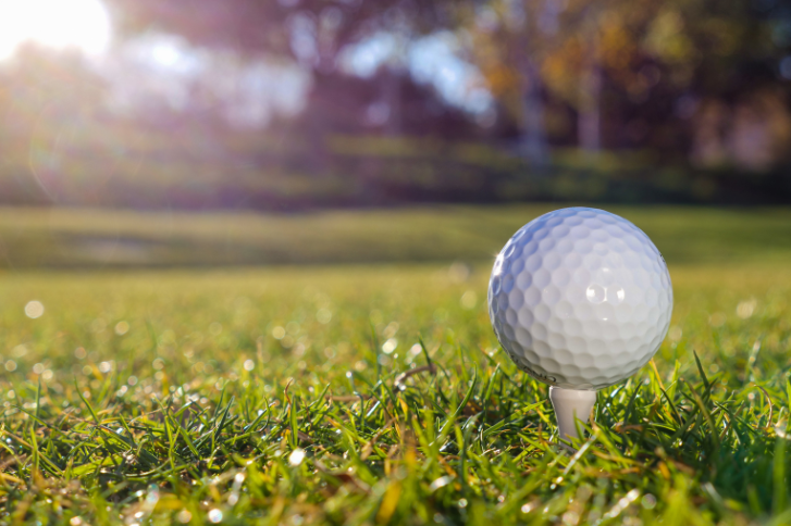 Golf ball on a tee representing Stinger Golf’s trademark litigation victory against LIV Golf